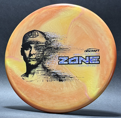 Adam Hammes—2026 Tour Series—Discraft Zone—Orange-Yellow Swirl—Black, Silver Holographic Glitter