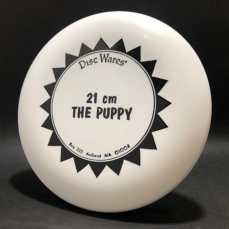 1980-1-1—Dynamic Discs Puppy—White—Black