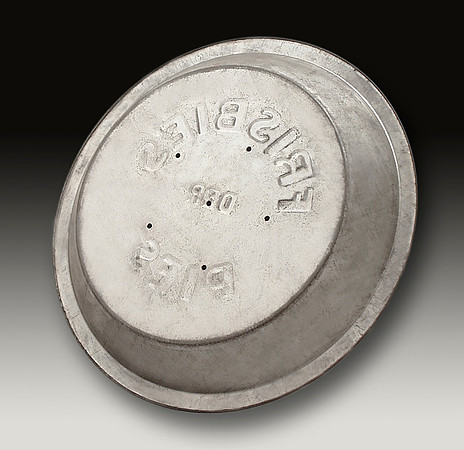 Pie Tin—Frisbie Pie Co.—Small Sunken Letters, 6 Holes—Bottom