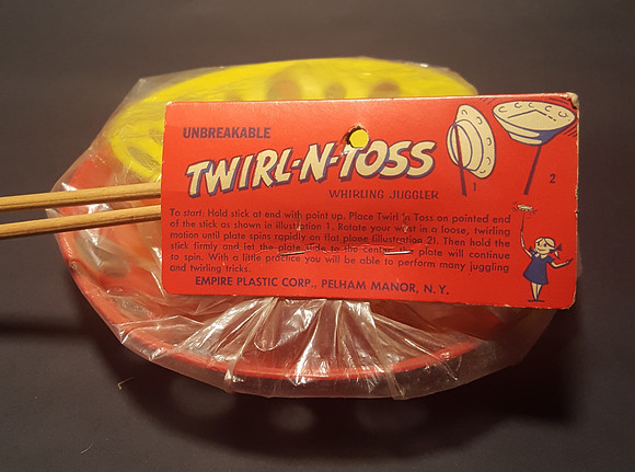 Empire Plastics—TWIRL-N-TOSS—Two Plate Set—Detail—Header Back