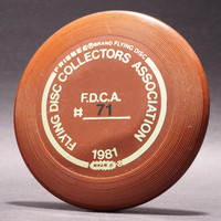 FDCA Member #72—Dennis Burns—Wham-O Mini—Brown—Gold, Black