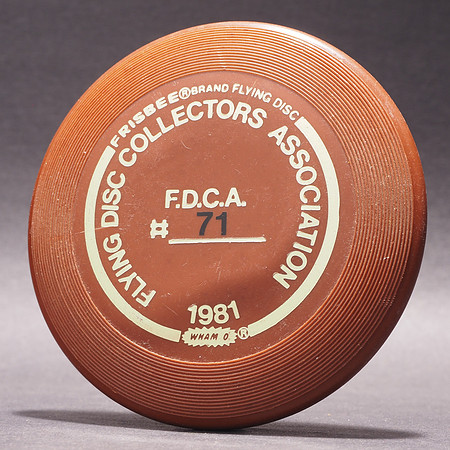 FDCA Member #72—Dennis Burns—Wham-O Mini—Brown—Gold, Black